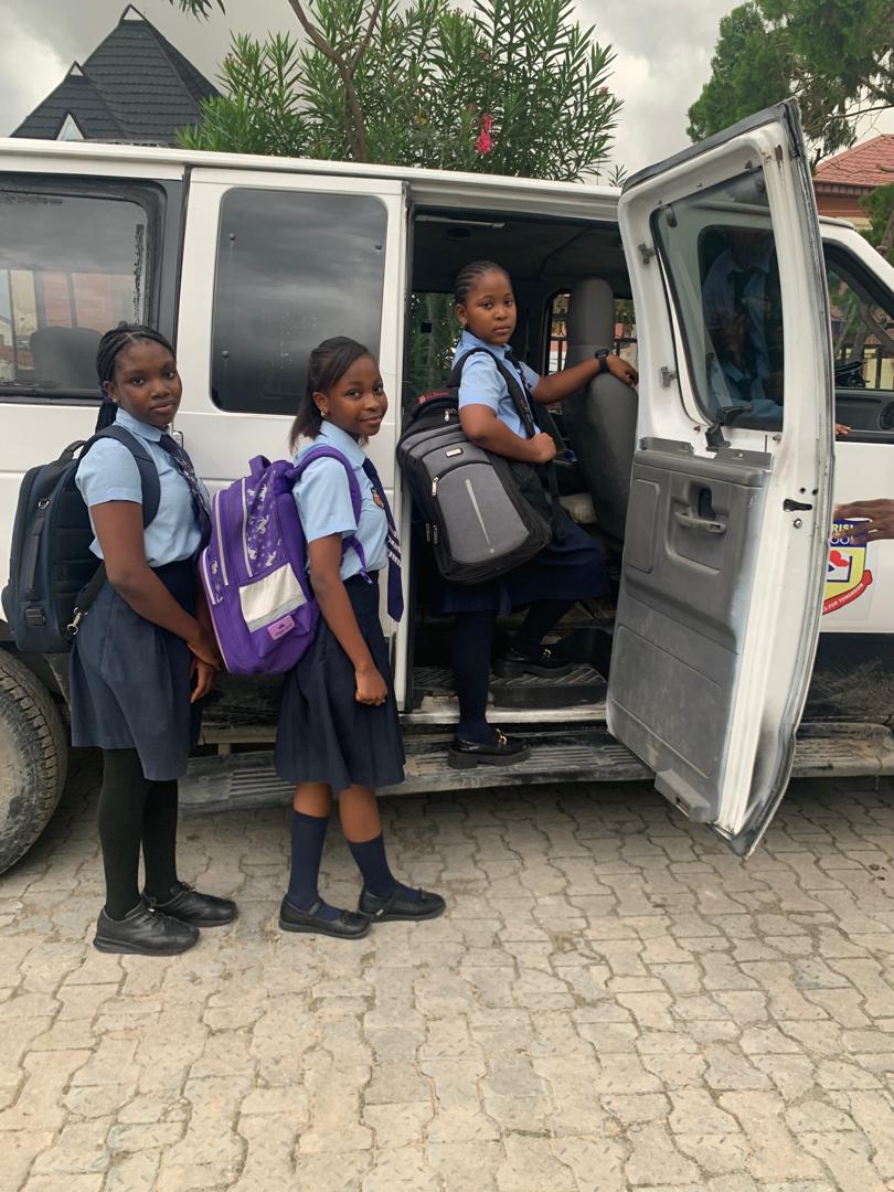 Pedrisi pupils boarding the school van