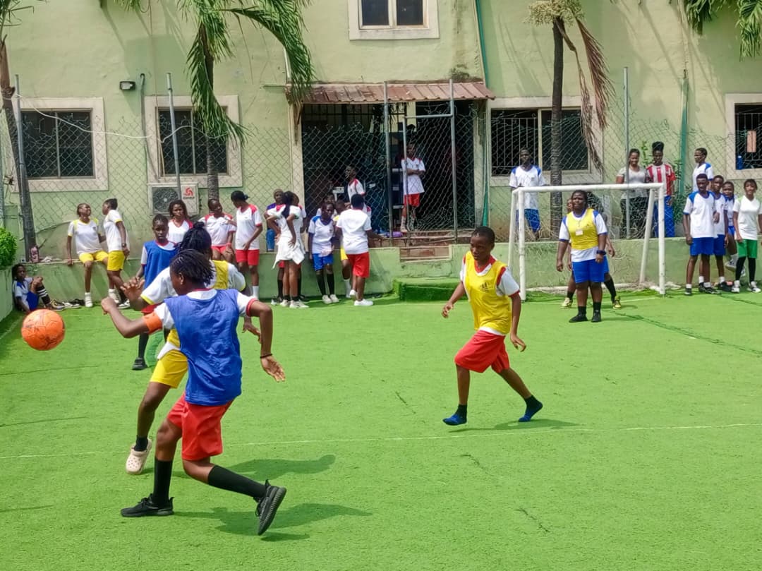 Pedrisi girls playing football on campus pitch